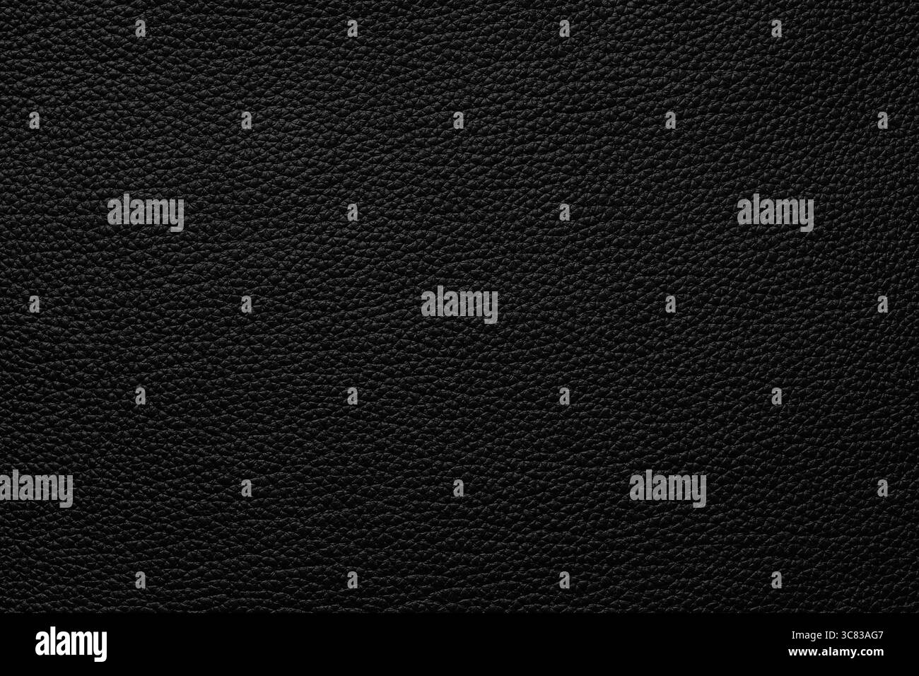 black leather background, natural hide texture closeup Stock Photo