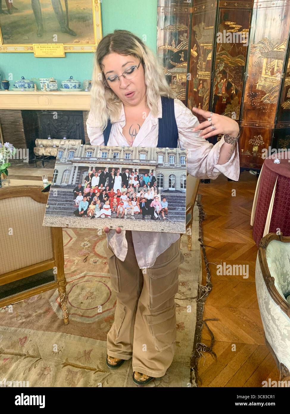 Chateau Bizi France French monument historic place gardens museum old ancient fountain water lake piano harp playing play people performance - Smartphone Captured Stock Image