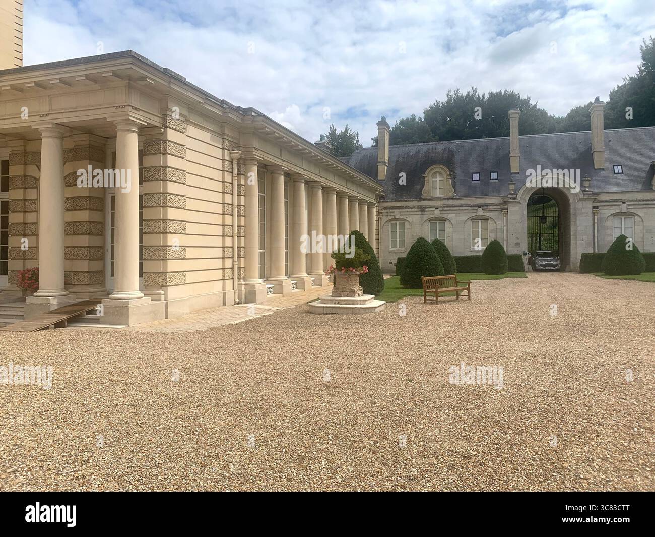 Chateau Bizi France French monument historic place gardens museum old ancient fountain water lake piano harp playing play people performance - Smartphone Captured Stock Image