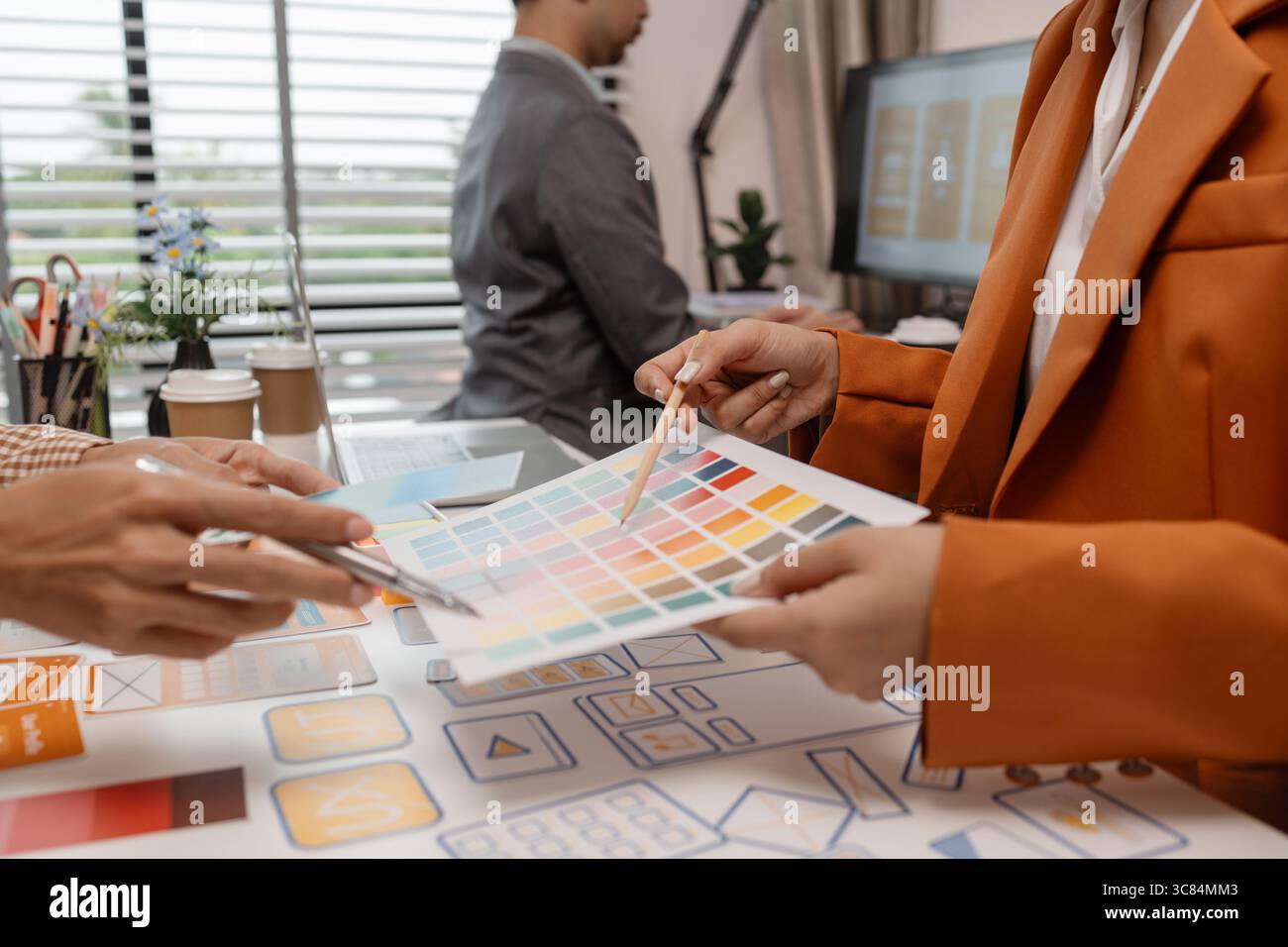 ux developer and ui designer brainstorming about mobile app interface wireframe design in the office, website designer, creative planning phone app de Stock Photo