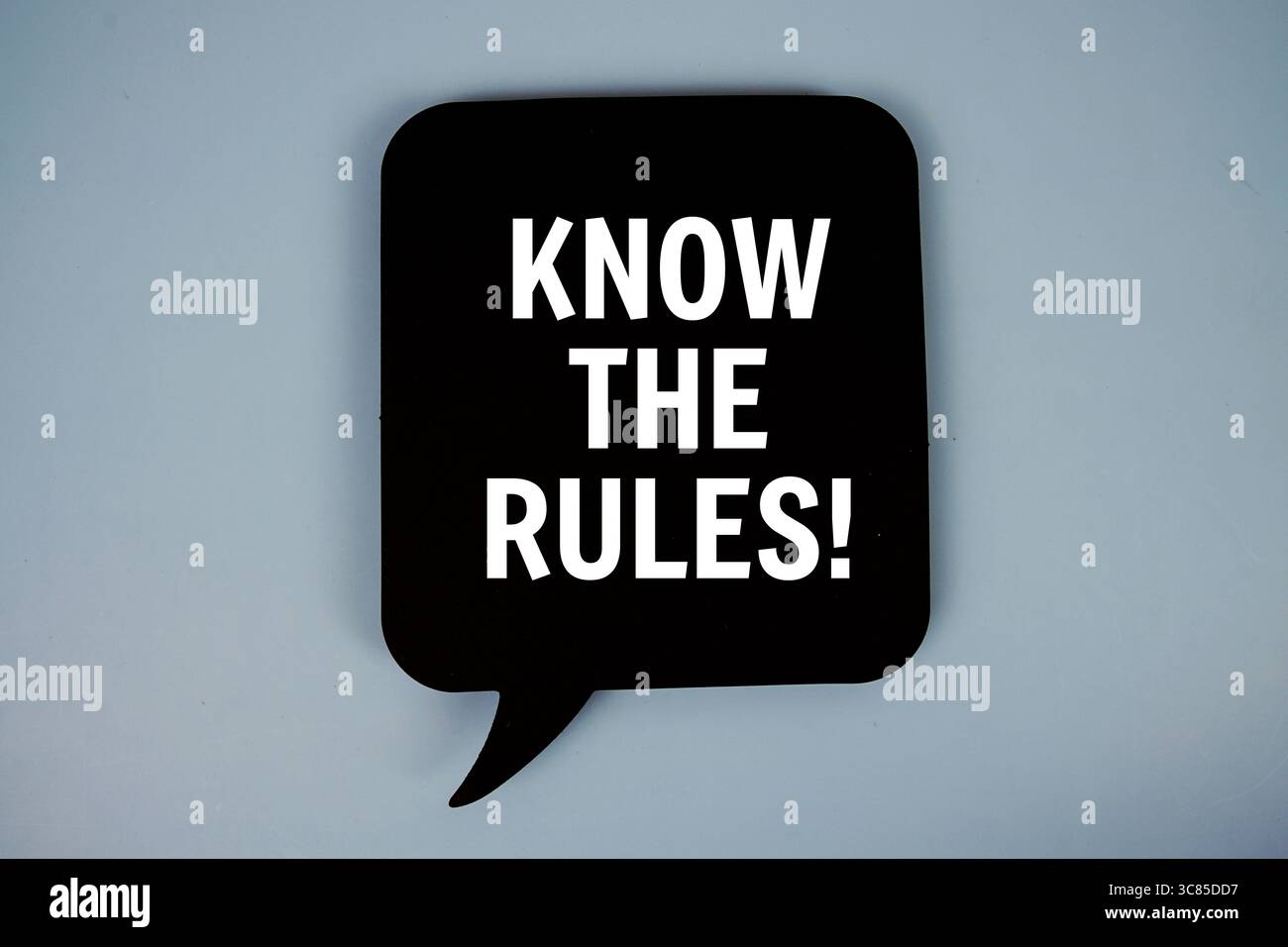 Know The Rules! text with speech bubble top view on blue background Stock Photo