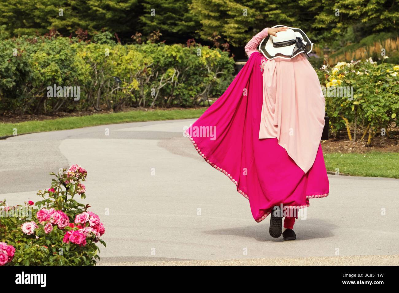 Visitors to Regents Park gardens London UK in summer Stock Photo