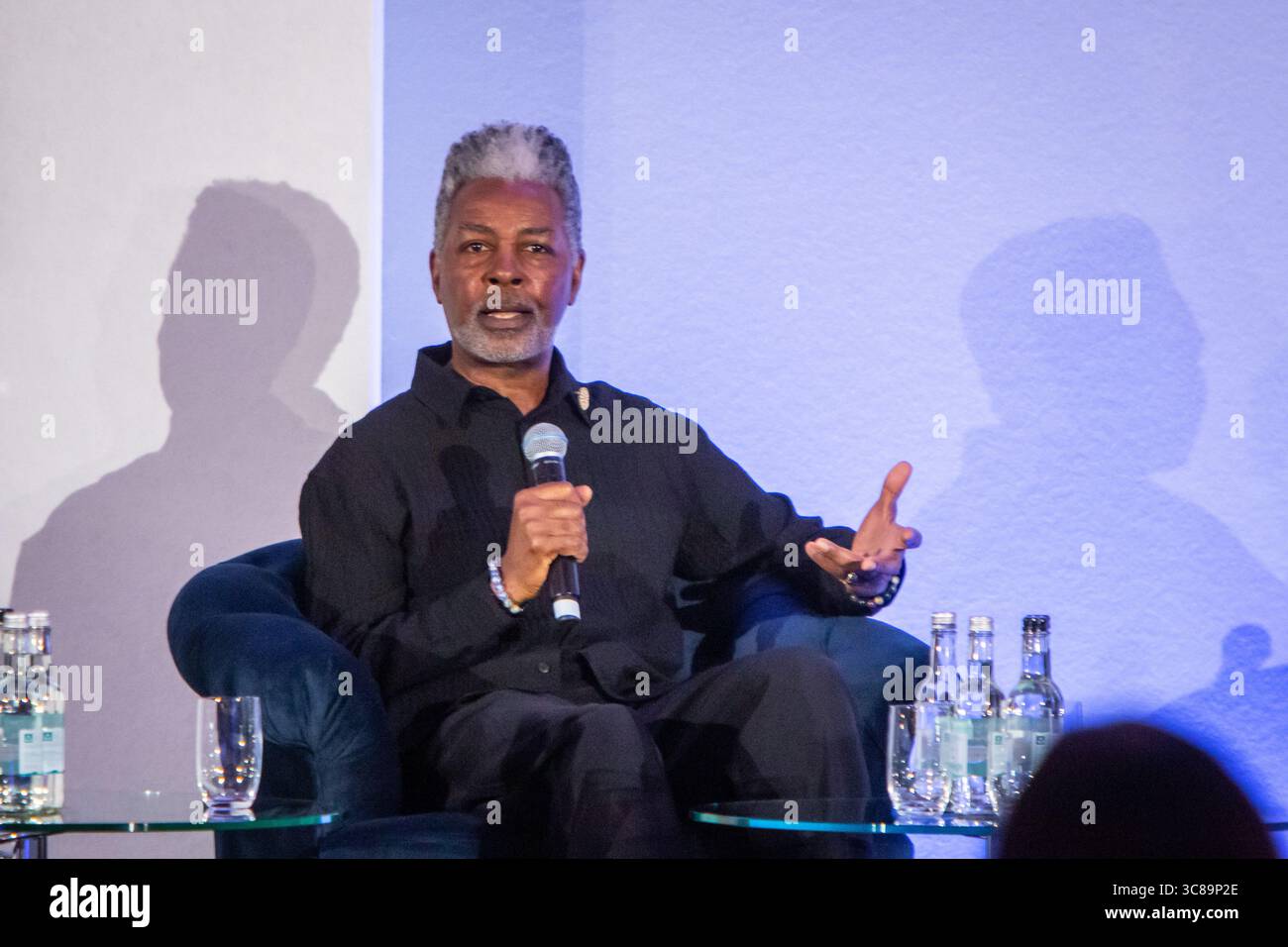 Painter Jonathan Green speaking at a conference Stock Photo