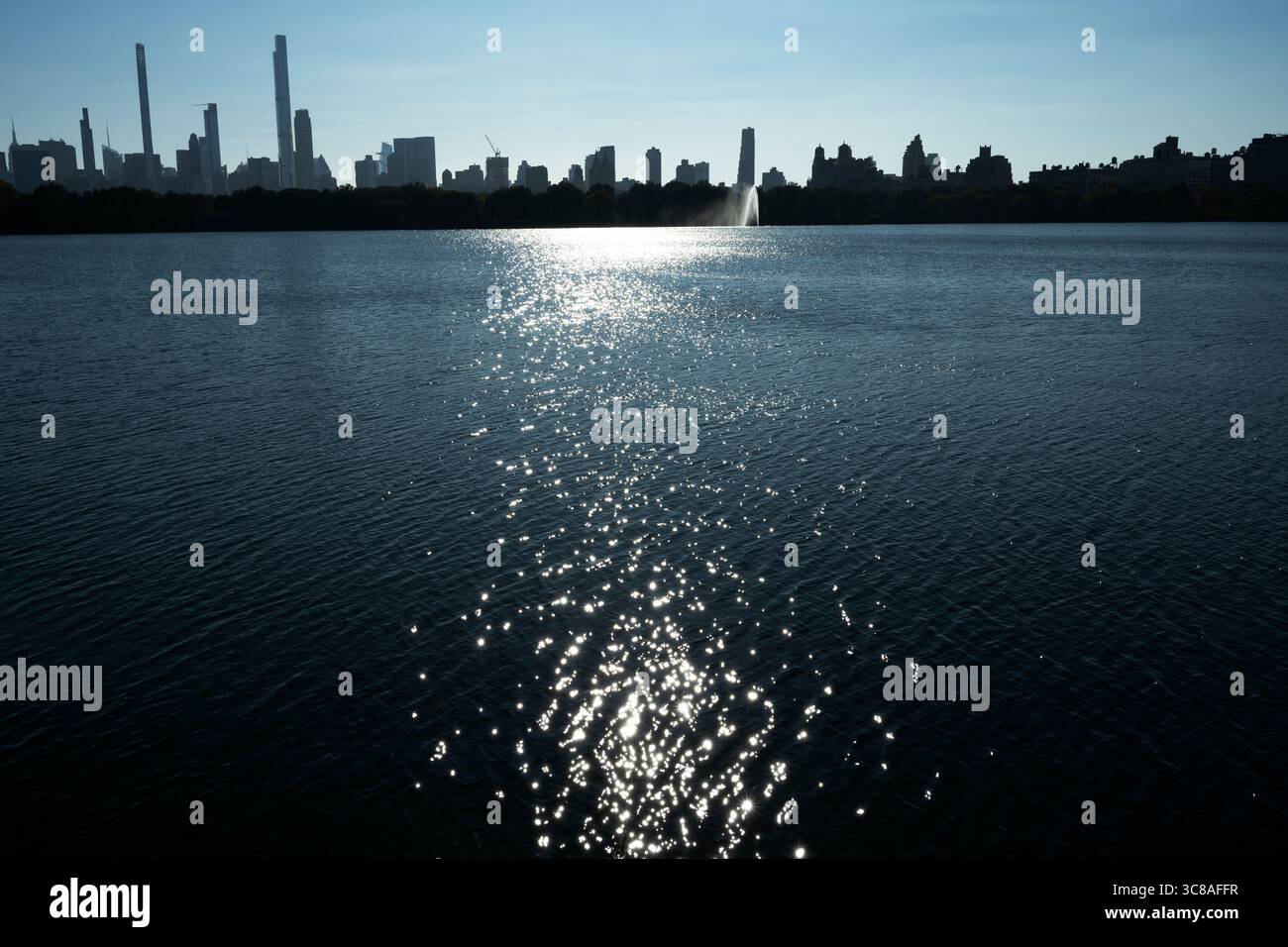 Midtown Manhattan skyline and Jacqueline Kennedy Onassis Reservoir, Central park NYC Stock Photo