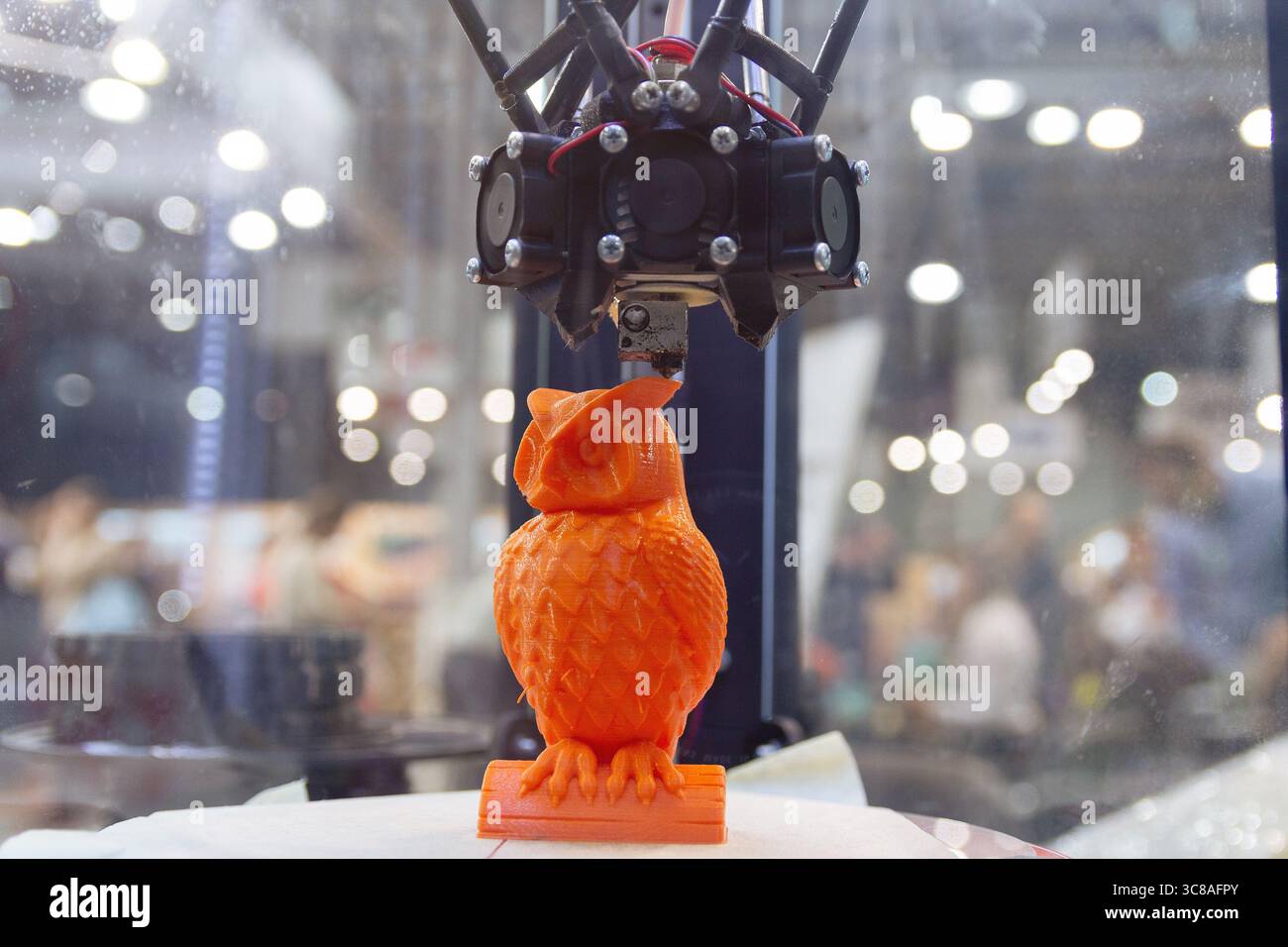 Three dimensional printing machine in operation,3D printer. Industry Stock Photo