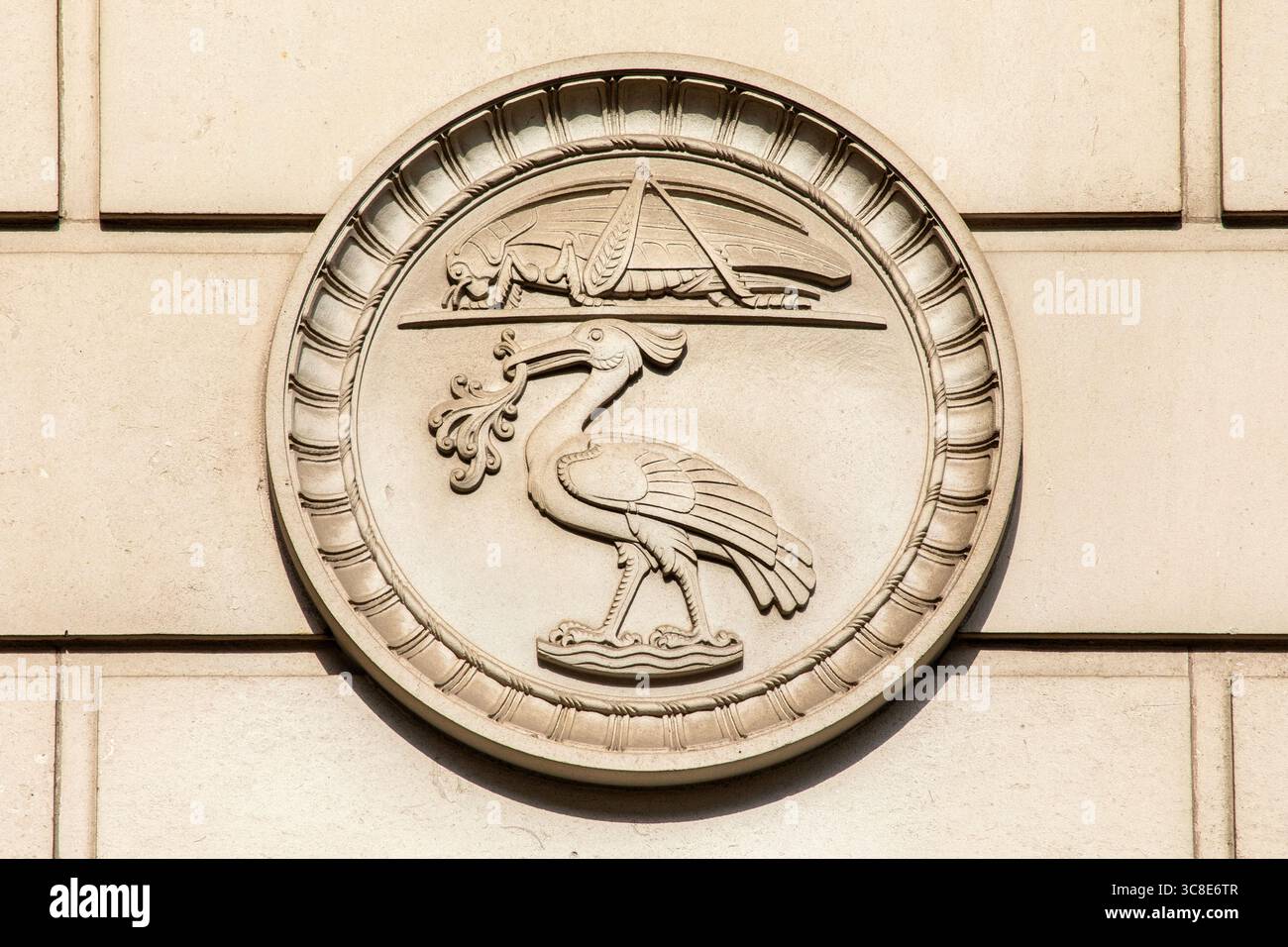 Close-up of a stone carving of a Liver Bird on the exterior of the Martins Bank Building on Water Street in Liverpool, UK - the Liver Bird is the symb Stock Photo