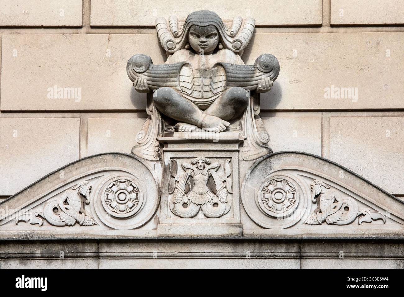 Liverpool, UK - September 20th 2024: Close-up of a stone sculpture on the exterior of the Martins Bank Building on Water Street in Liverpool, UK. Stock Photo