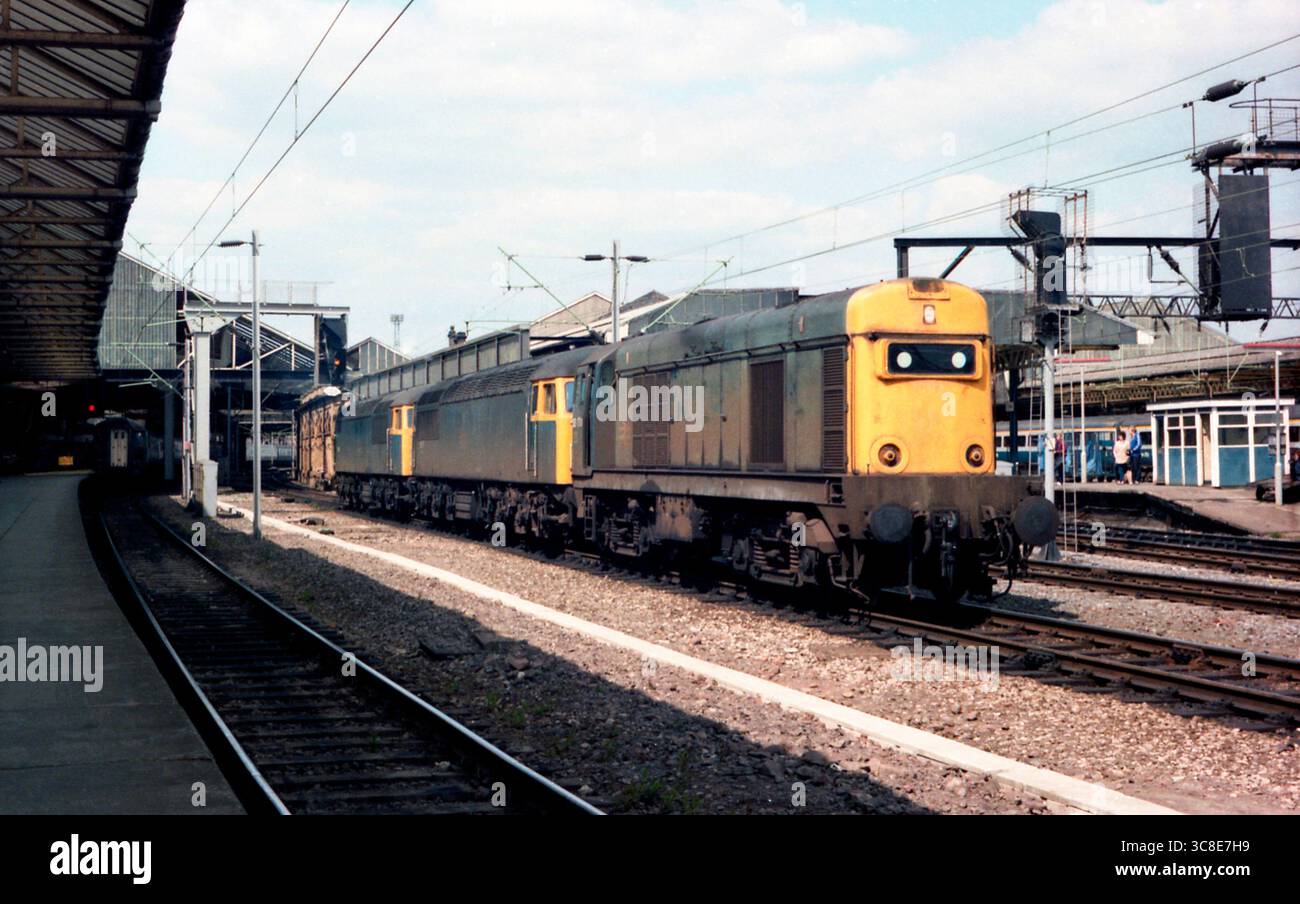Unidentified class 20 hauling two class 56 locomotives through Crewe ...
