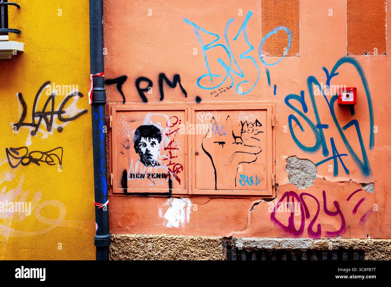 Urban Graffiti with BEN ZENO Stencil Portrait on Wall Stock Photo