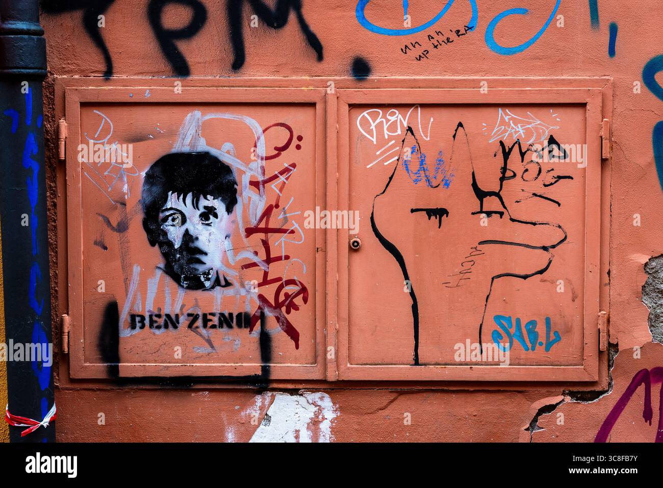 Urban Graffiti with BEN ZENO Stencil Portrait on Wall Stock Photo