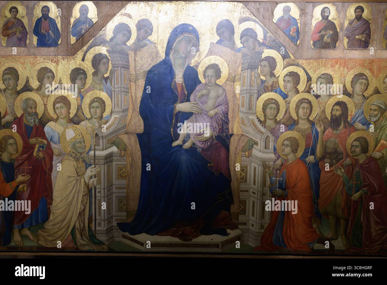 The Maestà altarpiece by Duccio di Buoninsegna depicting the Madonna ...