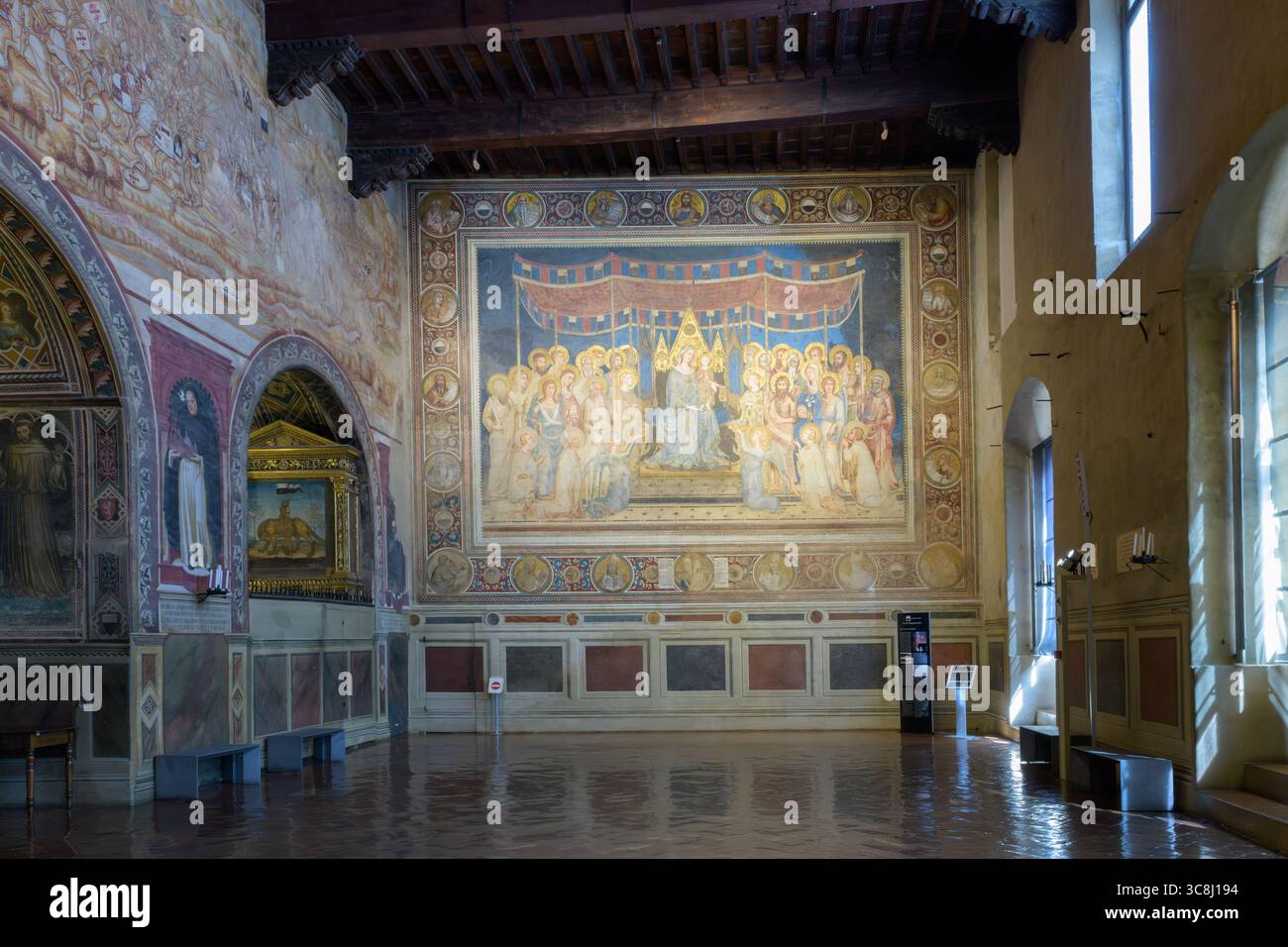 interior-view-of-sala-del-mappamondo-with-simone-martini-s-maest