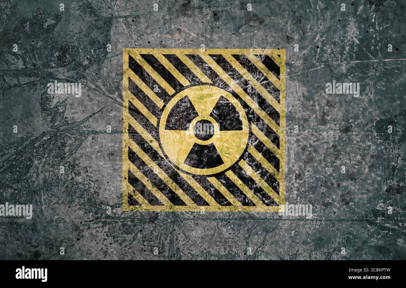 Radioactive sign on grey textured surface. Radiological pollution Stock Photo