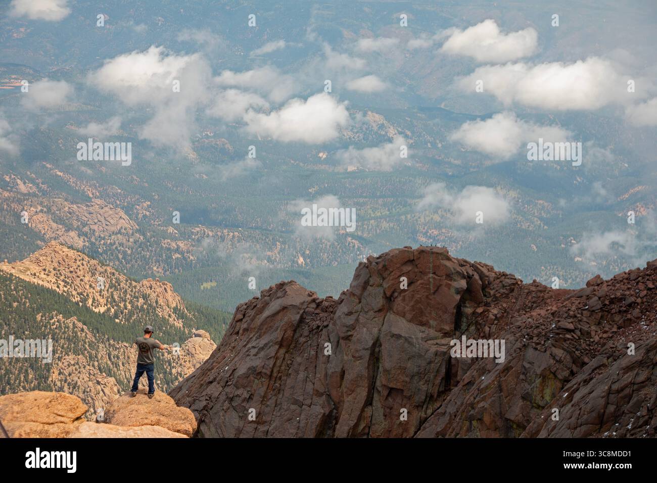 Colorado Springs, Colorado - A man takes photos from the rocks just ...