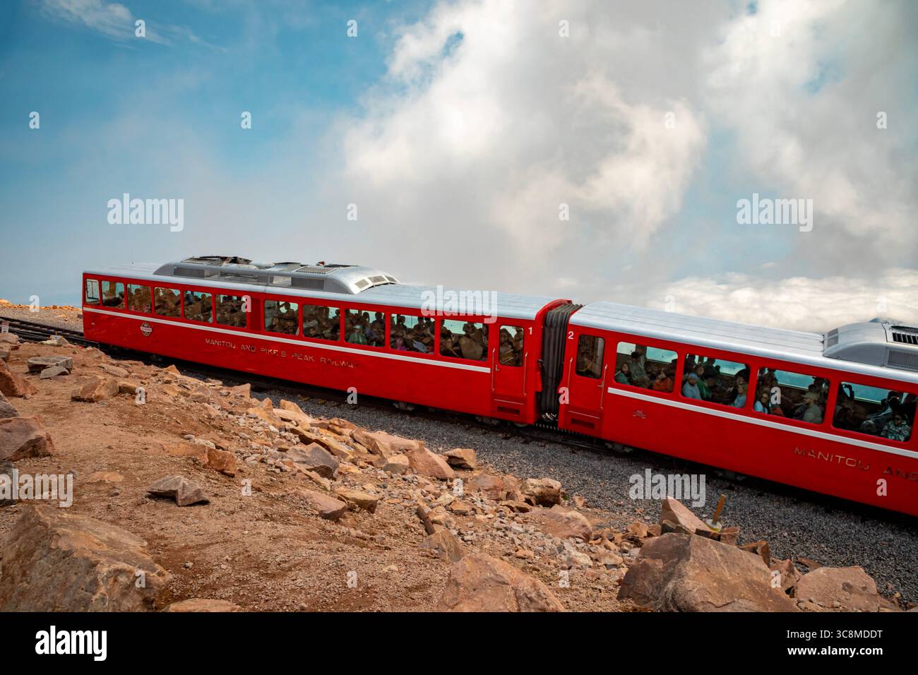 Colorado Springs, Colorado - The Manitou and Pikes Peak Railway at the summit of Pikes Peak. The cog railway takes tourists to the summit of the 14,11 Stock Photo