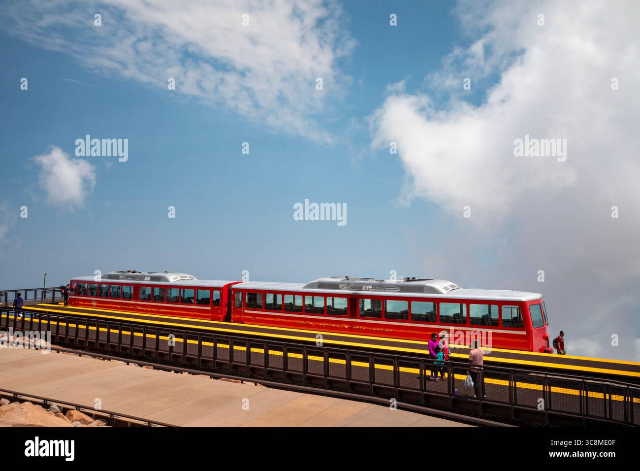 Colorado Springs, Colorado - The Manitou and Pikes Peak Railway at the summit of Pikes Peak. The cog railway takes tourists to the summit of the 14,11 Stock Photo