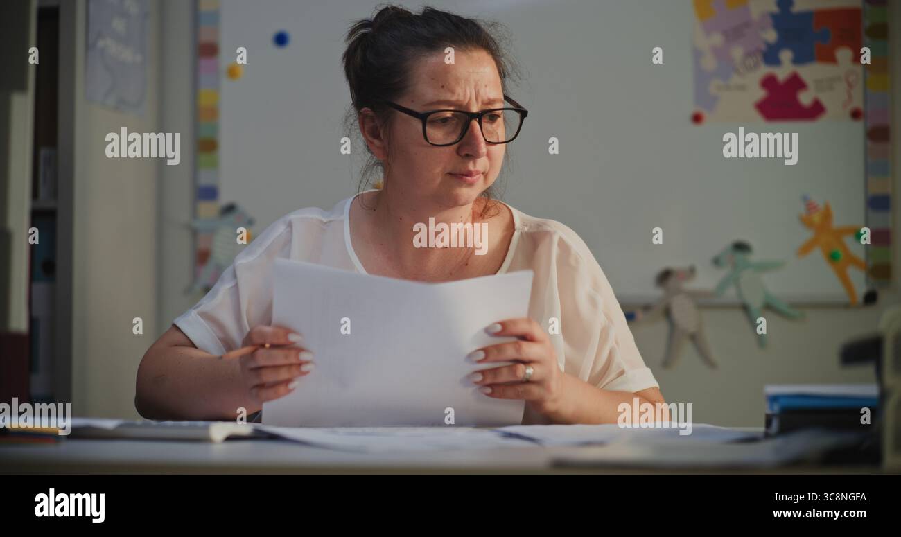 Let Check Homework Female Teacher Checking Homework of Students, Grading School Tests ...