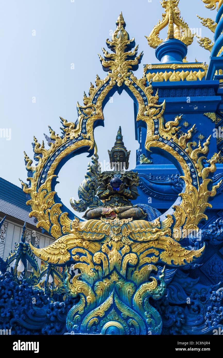 The Blue Temple, or Wat Rong Suea Ten, is a stunning temple shining in ...