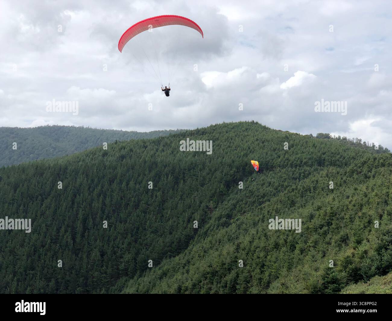 Paragliders at altitude - Smartphone Captured Stock Image