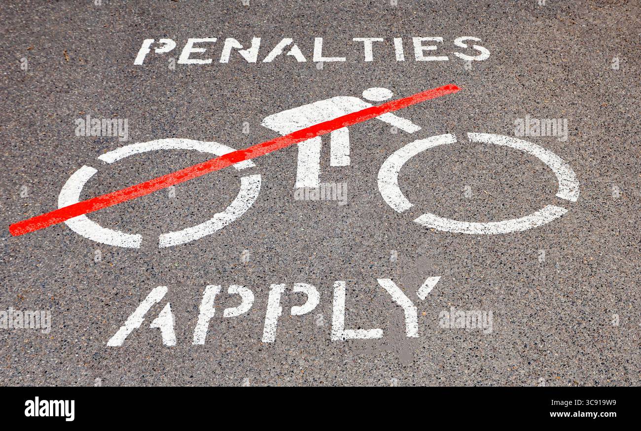 Sign for No Cycling area indicating an infringement penalty applies Stock Photo