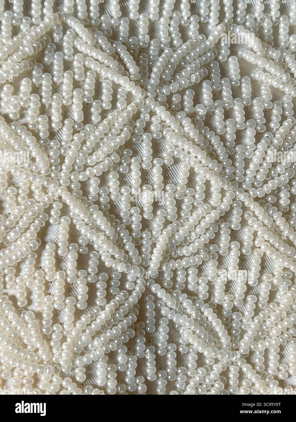 Embroidery with little pearls. - Smartphone Captured Stock Image