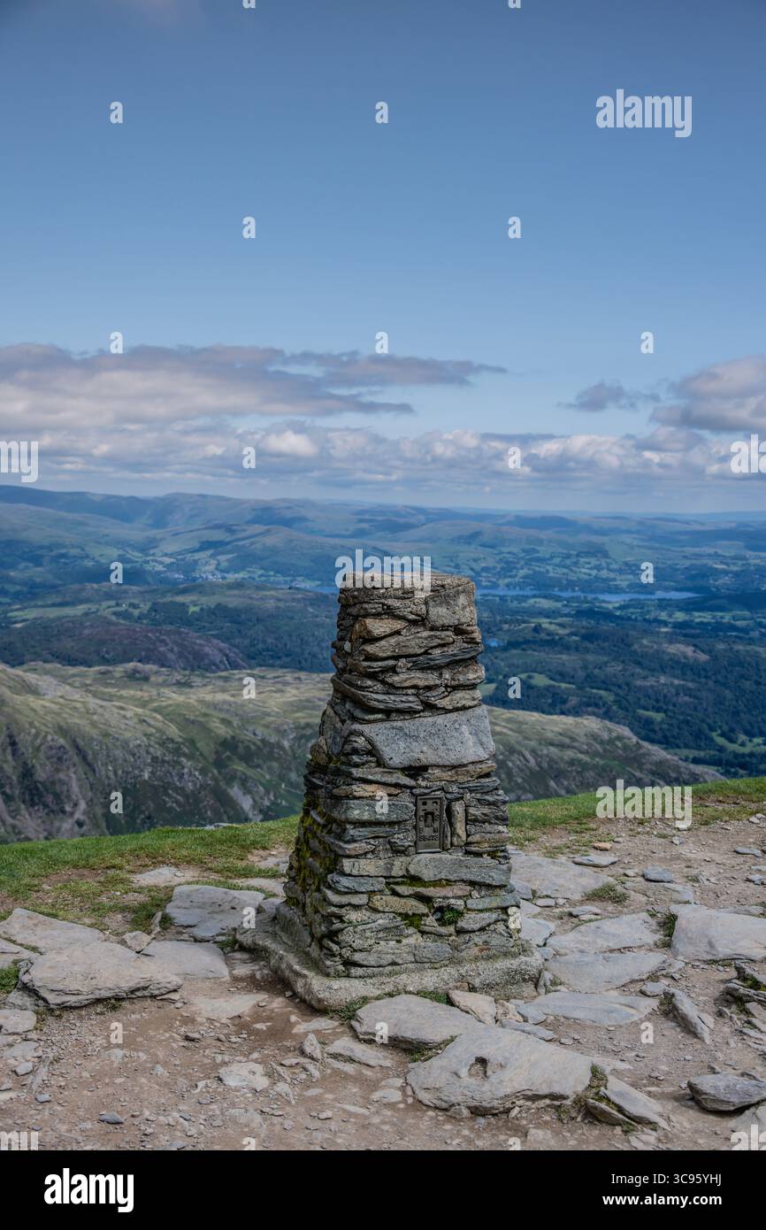 The Ordnance Survey (OS) summit cairn on Coniston Old Man, English Lake District. Stock Photo