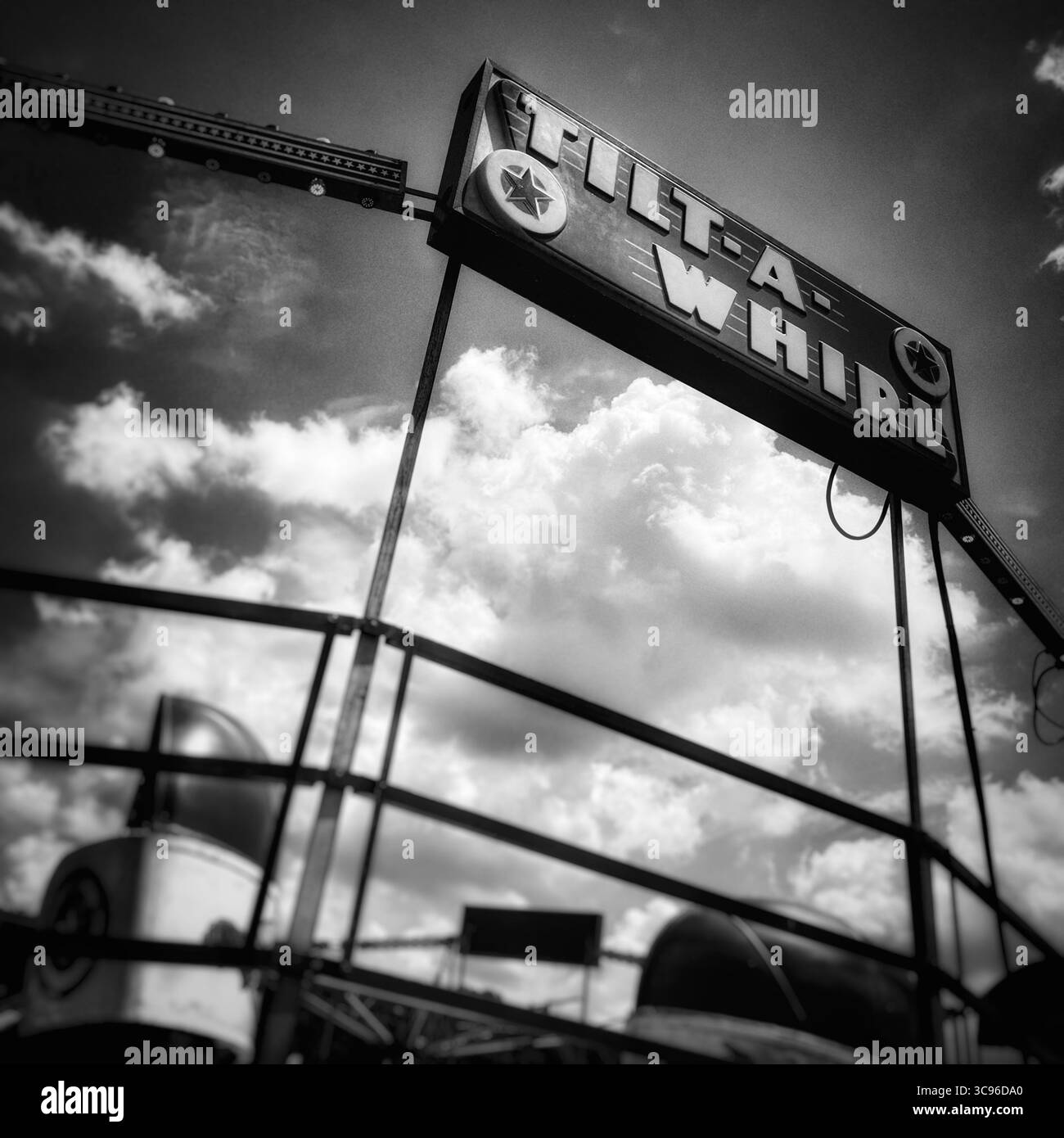 Tilt-A-Whirl county fair ride in black and white - Smartphone Captured Stock Image