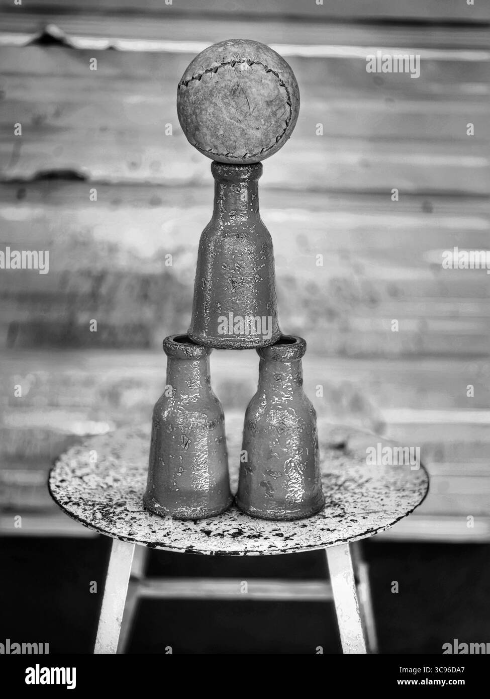 Vintage milk bottle game at the county fair in black and white - Smartphone Captured Stock Image