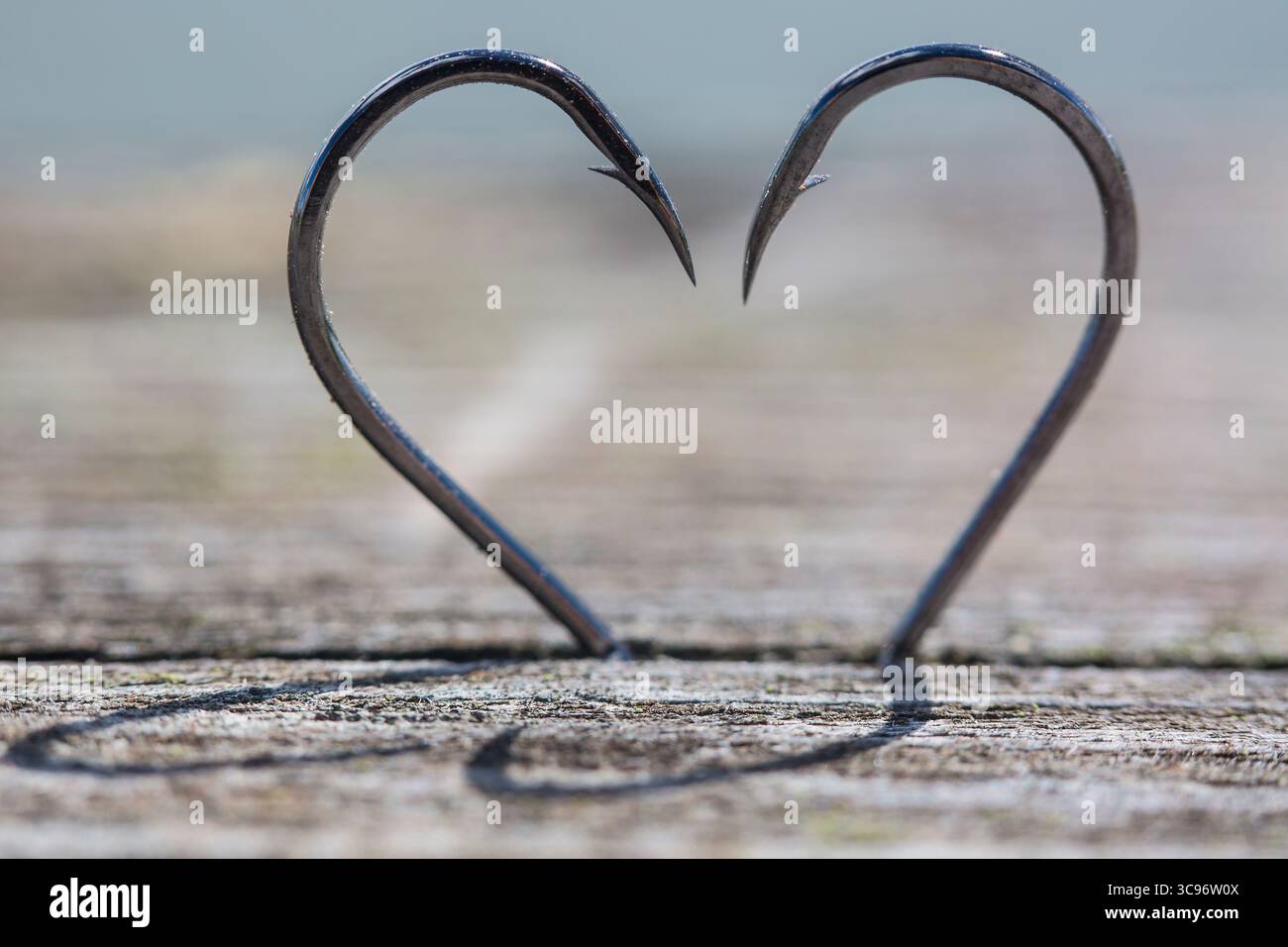 Love fishing hook hi-res stock photography and images - Alamy