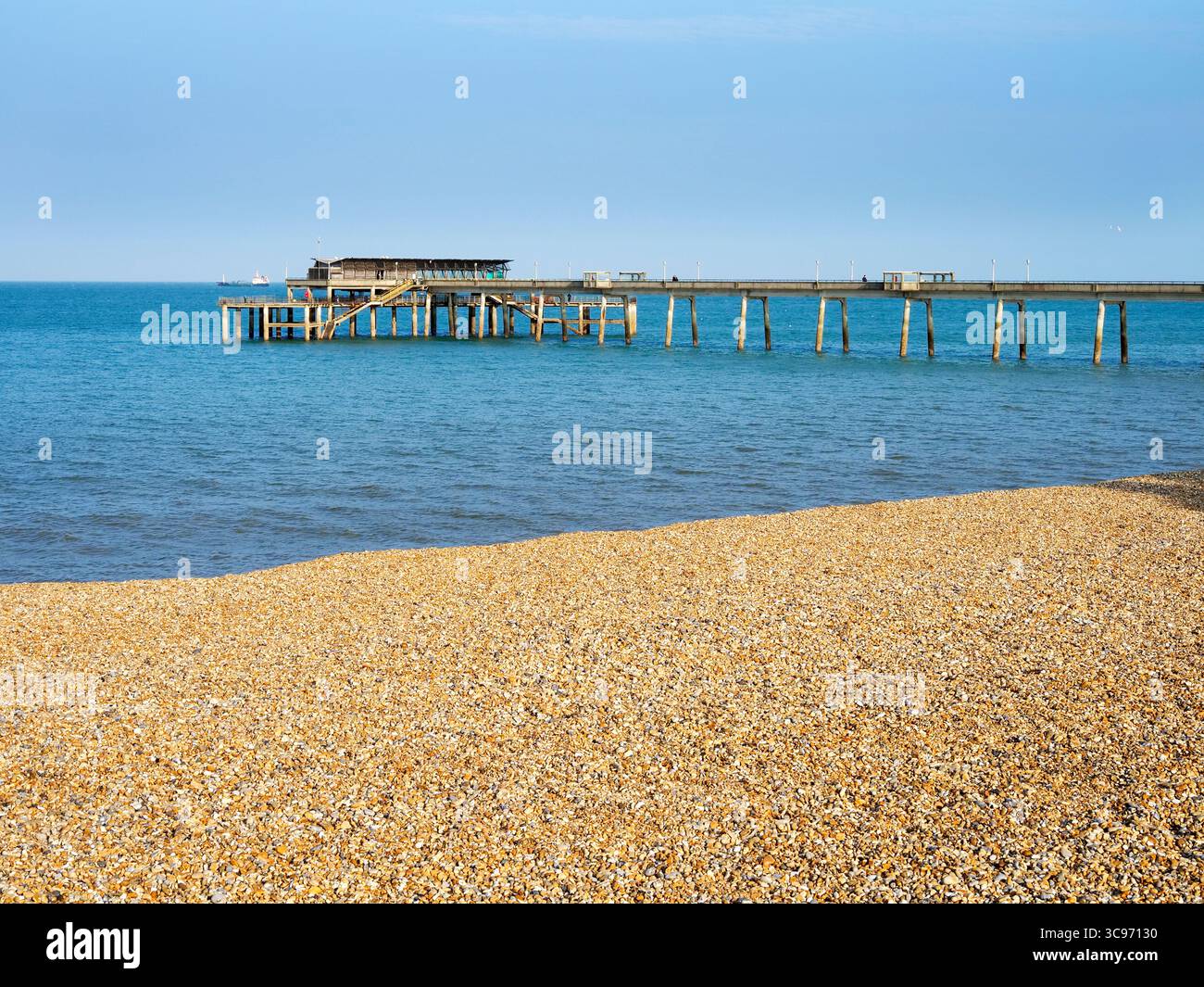 Shingle beach and pier at Deal in Kent England Stock Photo