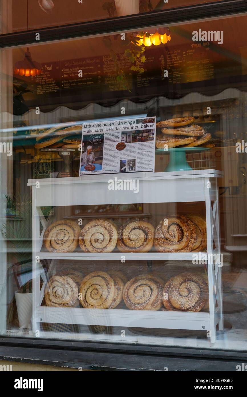 The Giant Cinnamon Bun from Haga in shop window at Haga, Gothenburg, Sweden in May Stock Photo