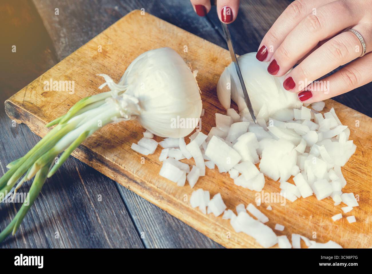 Woman hands cutting onion knife hi-res stock photography and images - Alamy