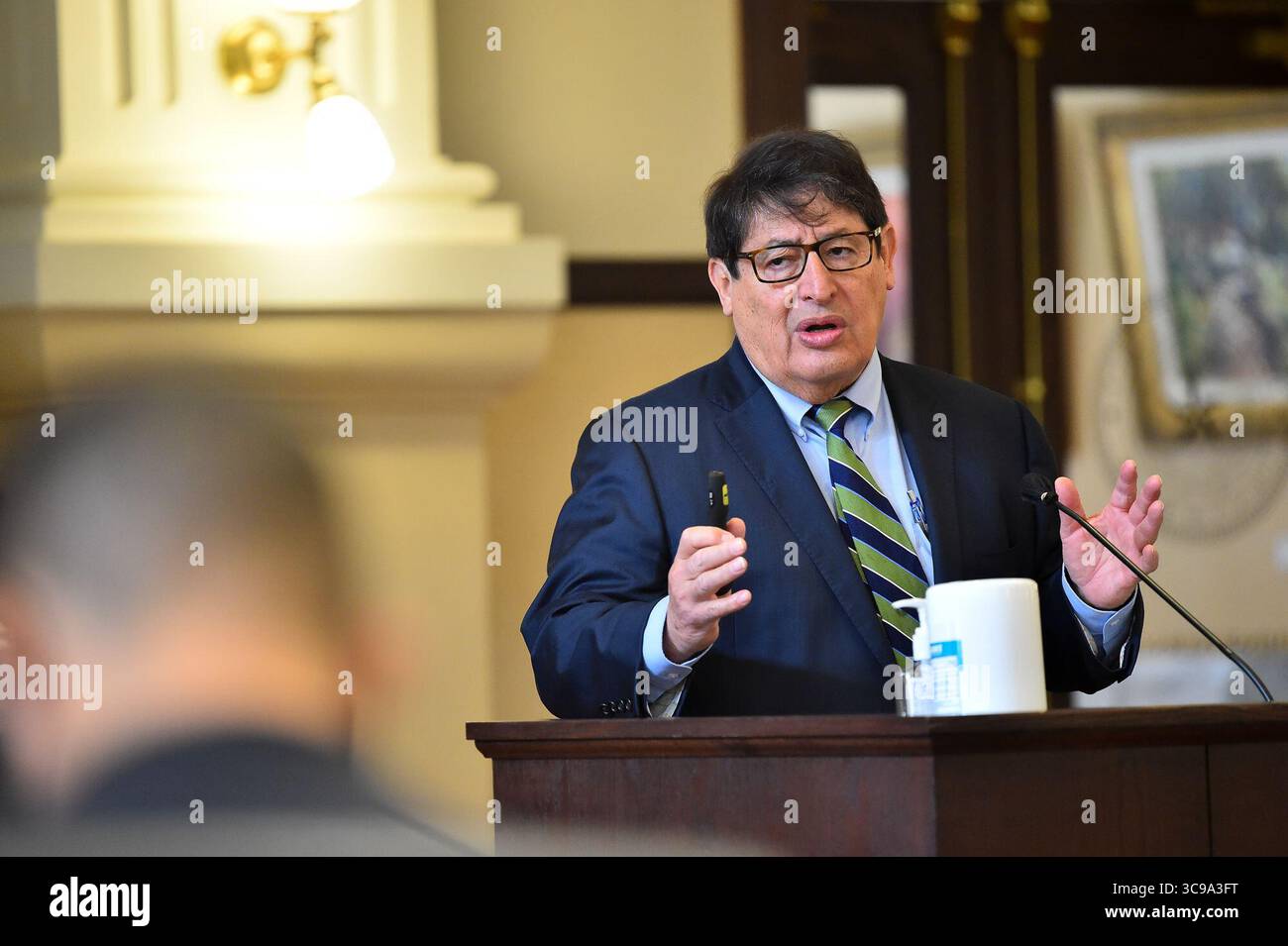 March 23, 2021, San Antonio, Texas, USA: University Health President and CEO George Hernandez speaks about COVID vaccinations during Tuesday's meeting of the Bexar County Commissioners. (Credit Image: © Robin Jerstad/San Antonio Express-News via ZUMA Press Wire) Stock Photo