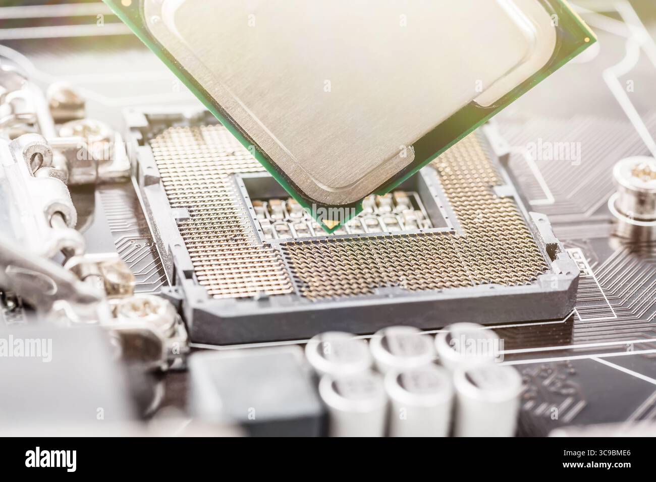 CPU installation close up in the motherboard. Stock Photo