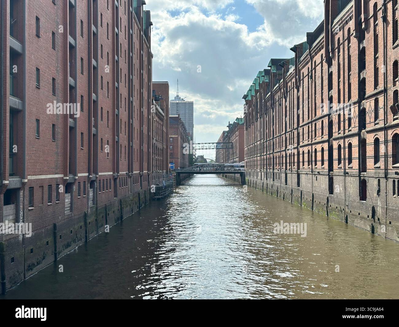 Canals and buildings in historic district of Hamburg Germany - Smartphone Captured Stock Image