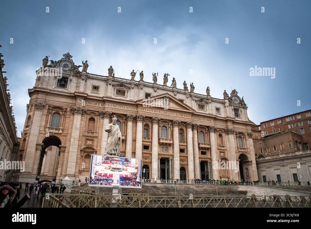 Peter Rome Tower VATICAN - JANUARY 15, 2025: St Peter Basilica towers over rain soaked ...