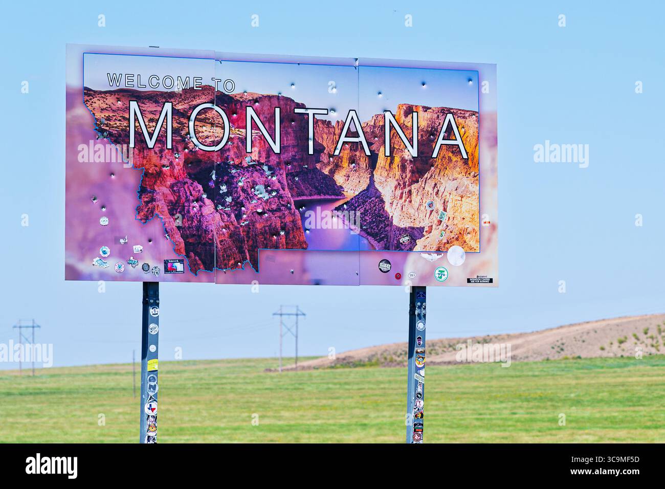 The Welcome to Montana highway landmark in the rural countryside of Alzada, Montana, at the border of the state of Wyoming, Northwestern USA. Stock Photo