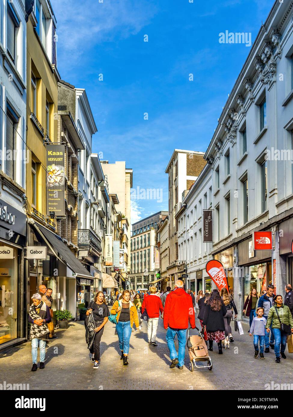 View along Wiegstraat, a busy shopping street in central Antwerp, Belgium. Stock Photo