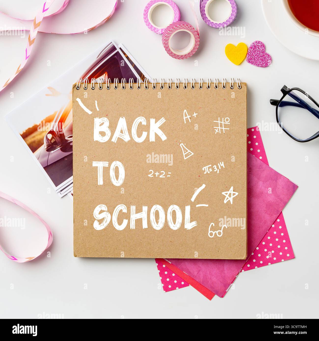 Creative back-to-school supplies arranged on a desk with writing materials and decorations for a productive study session Stock Photo