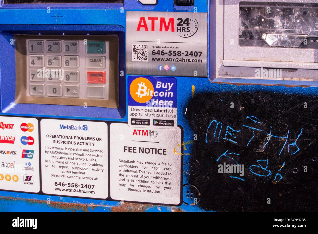 New York, USA. A Bitcoin ATM is advertised in the window of a New York city  deli. Photo by Enrique Shore Stock Photo - Alamy