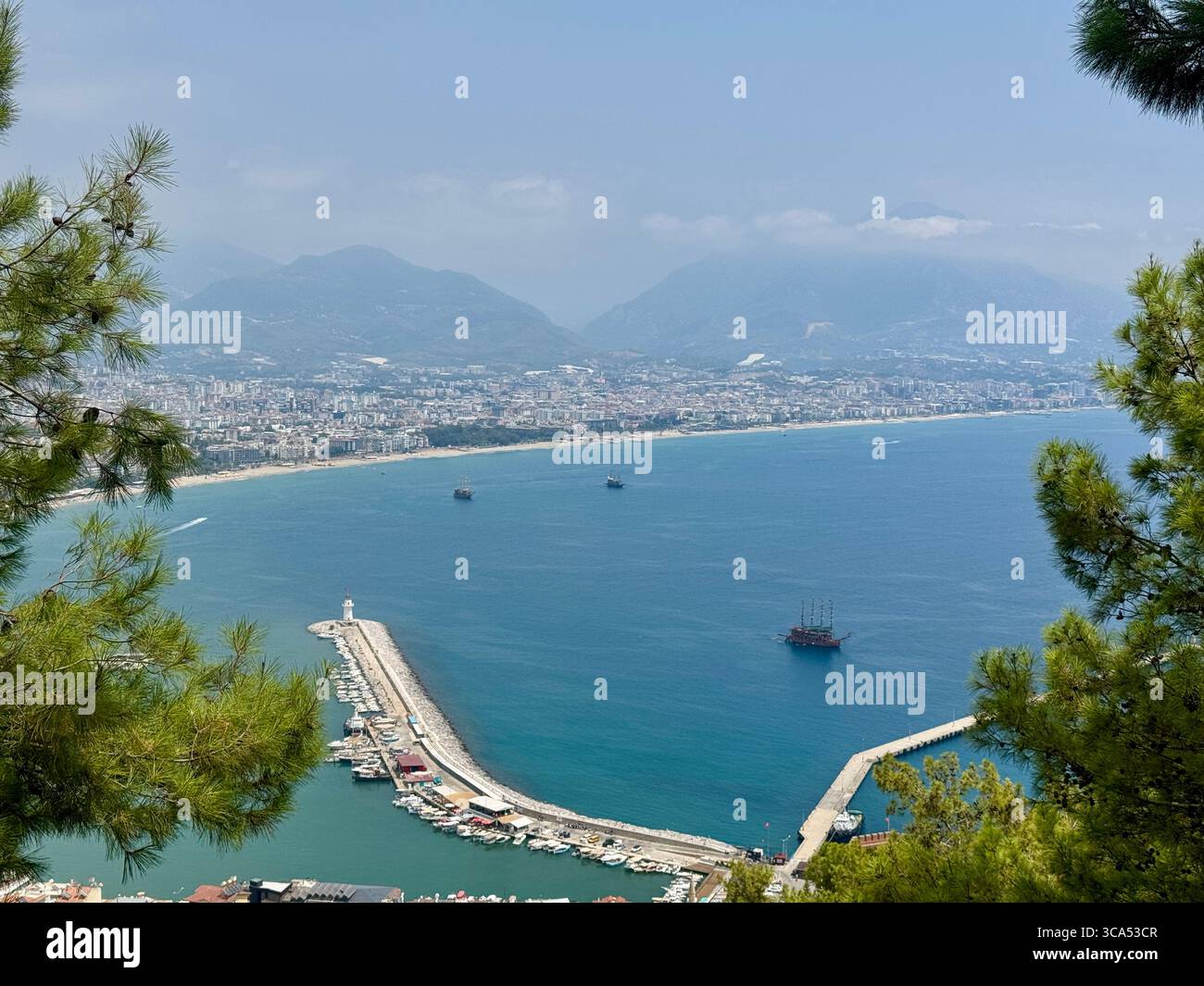 Photo is taken this year summer in Alanya Turkey. Beach, Mare and plants are visible. Blue sky with few clouds. Sunny and warm - Smartphone Captured Stock Image