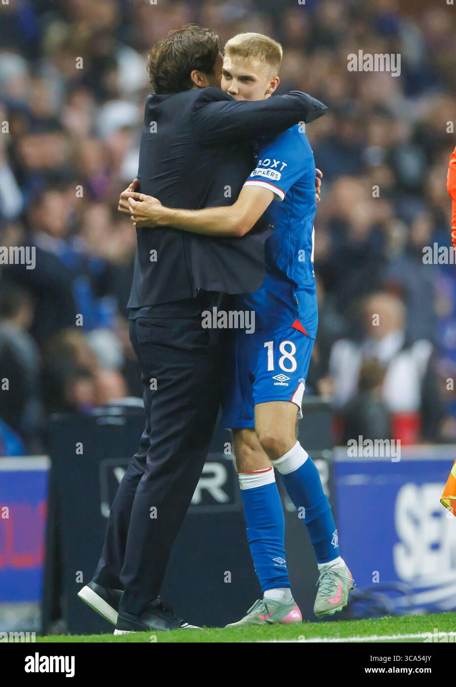 Rangers manager Russell Martin celebrates with Oliver Antman during the UEFA Champions League Third Qualifying round  match at Ibrox Stadium, Glasgow. Stock Photo