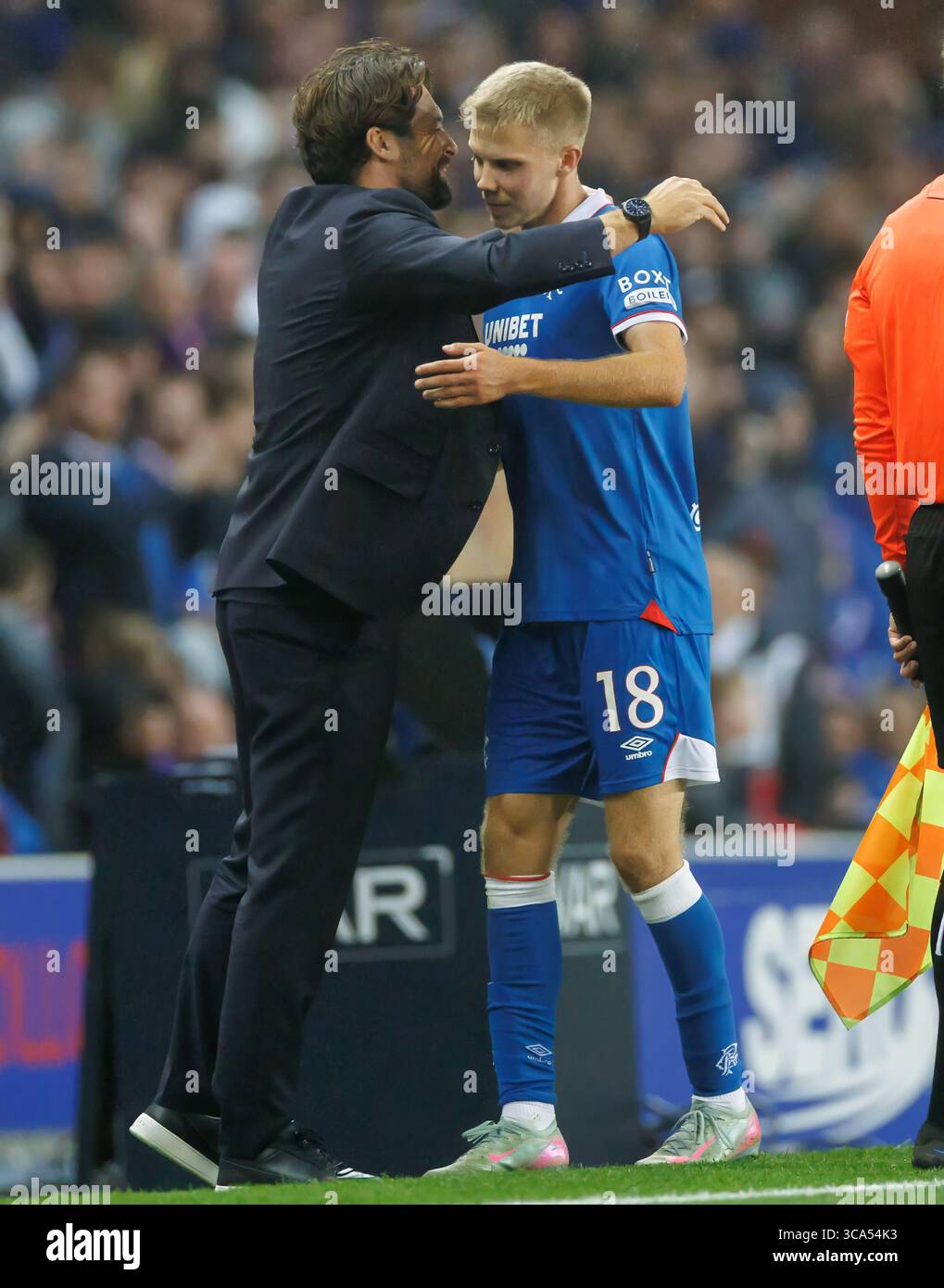 Rangers manager Russell Martin celebrates with Oliver Antman during the UEFA Champions League Third Qualifying round  match at Ibrox Stadium, Glasgow. Stock Photo