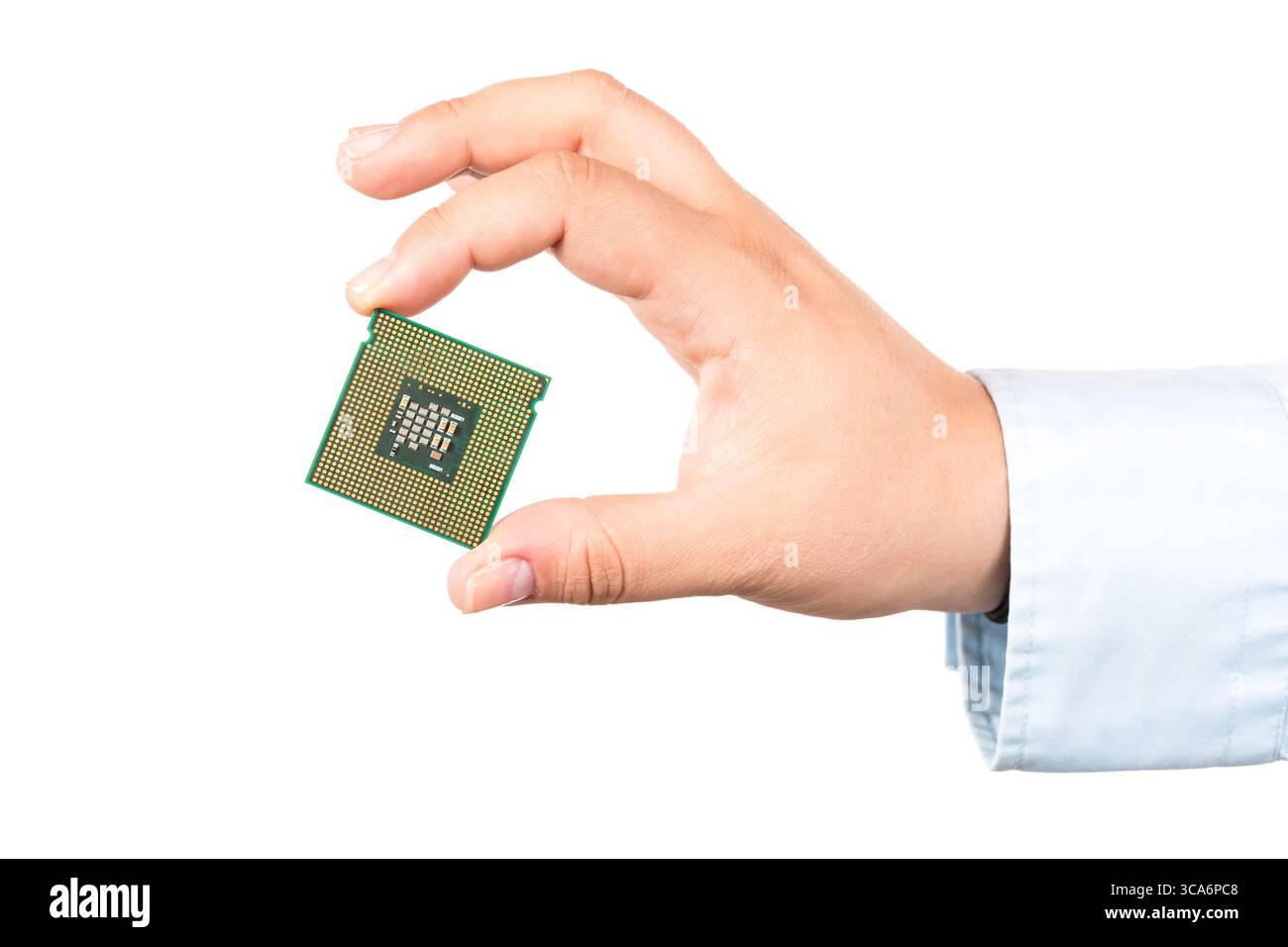 Hand holding CPU microchip computer isolated on white background. Stock Photo