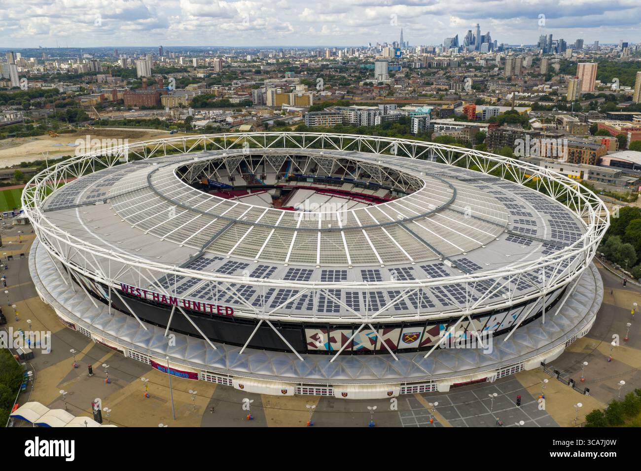 Aerial image of London Stadium, home of West Ham United, with the London skyline in the background. Stock Photo