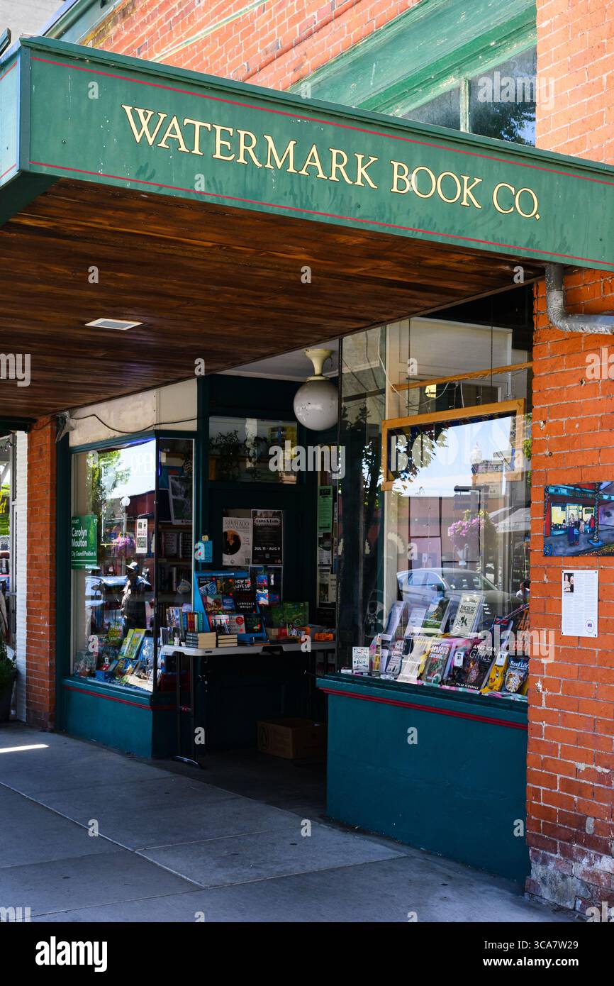 Anacortes, WA, USA - July 21, 2025; Facade with name on green canopy at Watermark Book Company Stock Photo