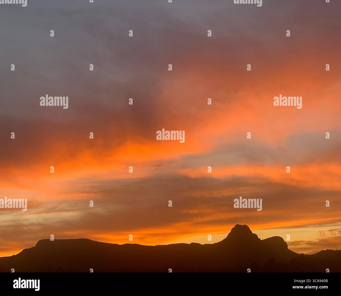 Vibrant Sonoran Desert Sunset behind Sombrero Peak - Smartphone Captured Stock Image