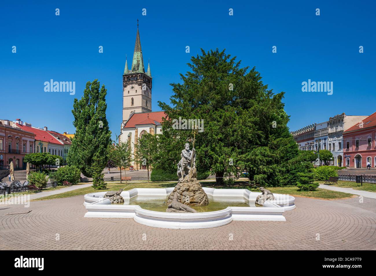 Neptune's fountain (Neptunova Fontana) and Cathedral of Saint Nicholas, Presov, Slovakia Stock Photo