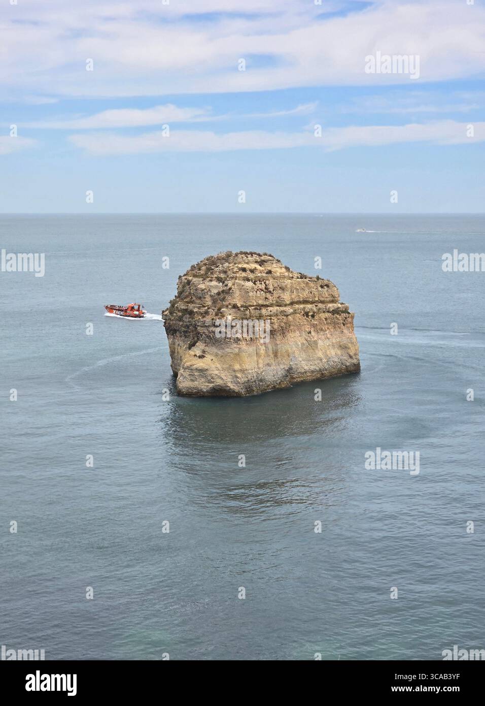 Albufeira coastal hiking trail along the dramatic cliffs and rock formations of the Algarve, Portugal, with stunning views over the Atlantic Ocean. - Smartphone Captured Stock Image