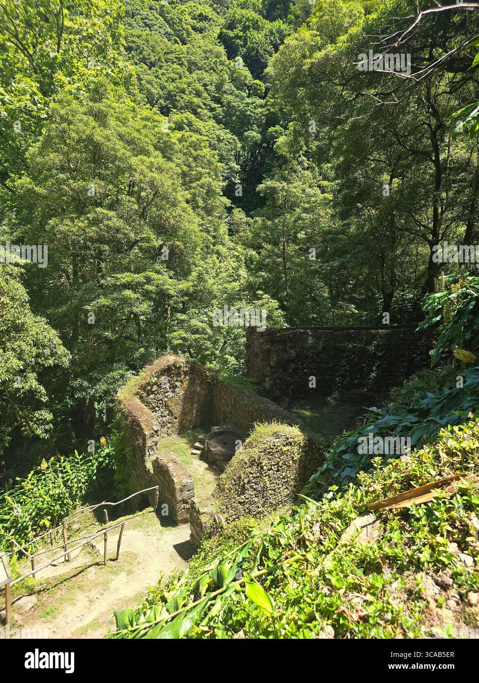 Pedestrian trail with remains of historic watermills in the Azores, Portugal. - Smartphone Captured Stock Image
